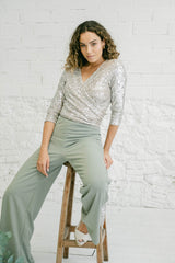 Two-Piece Wedding Guest Outfit with Multi-Position Sequin Top and Green Palazzo