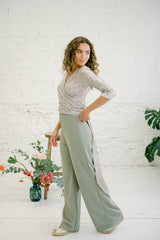 Two-Piece Wedding Guest Outfit with Multi-Position Sequin Top and Green Palazzo