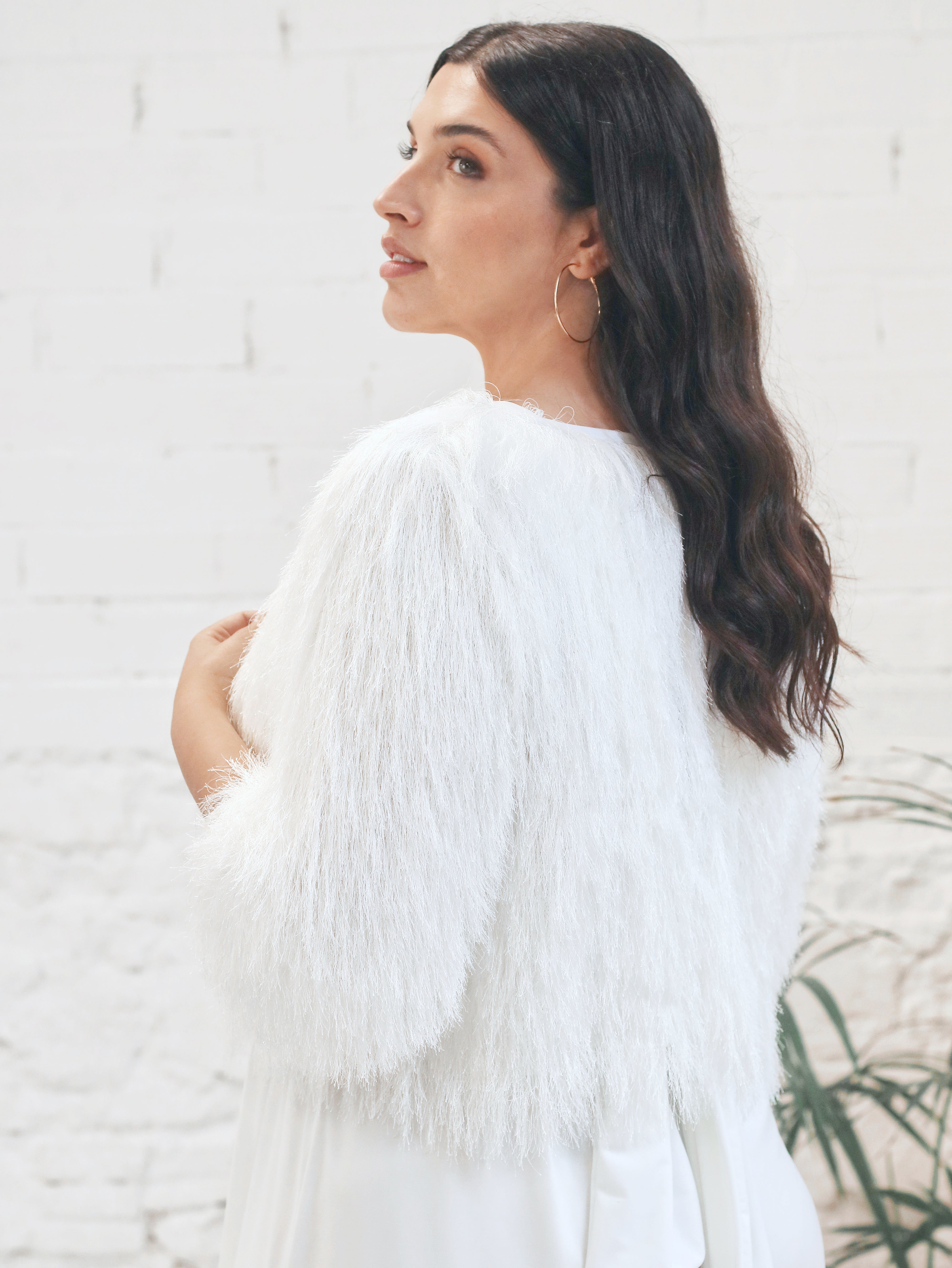 Bridal jumpsuit with short fur jacket