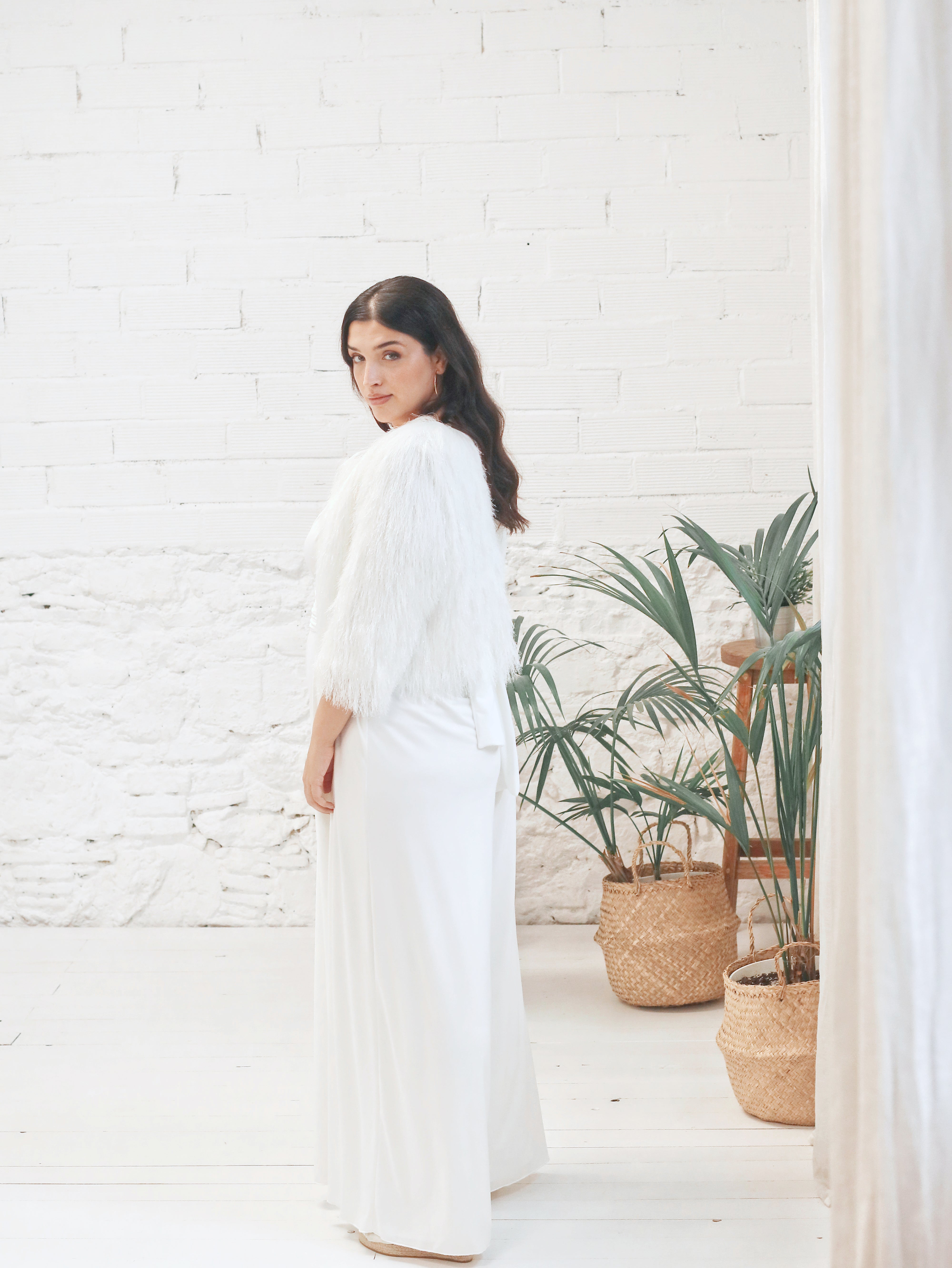 Bridal jumpsuit with short fur jacket