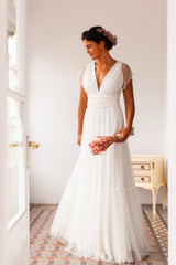 Vestido de novia con falda de tul escalonada para verano