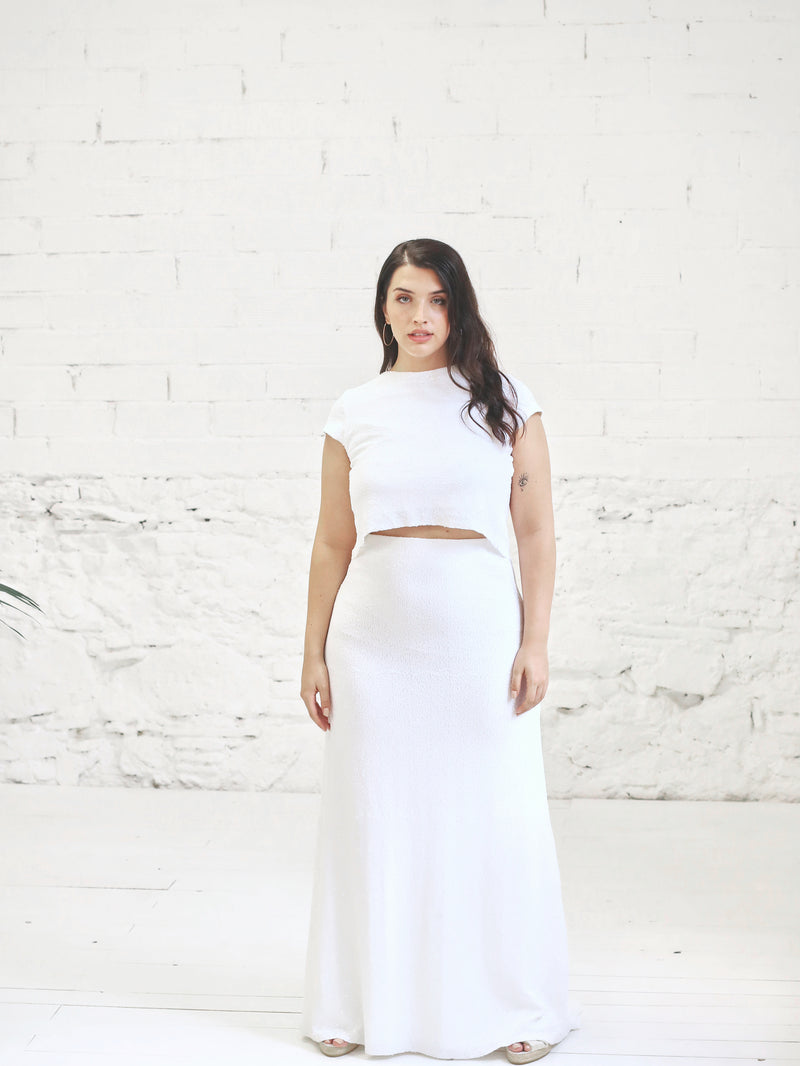 Wedding dress with mermaid skirt and short sleeve crop top with white miro sequin