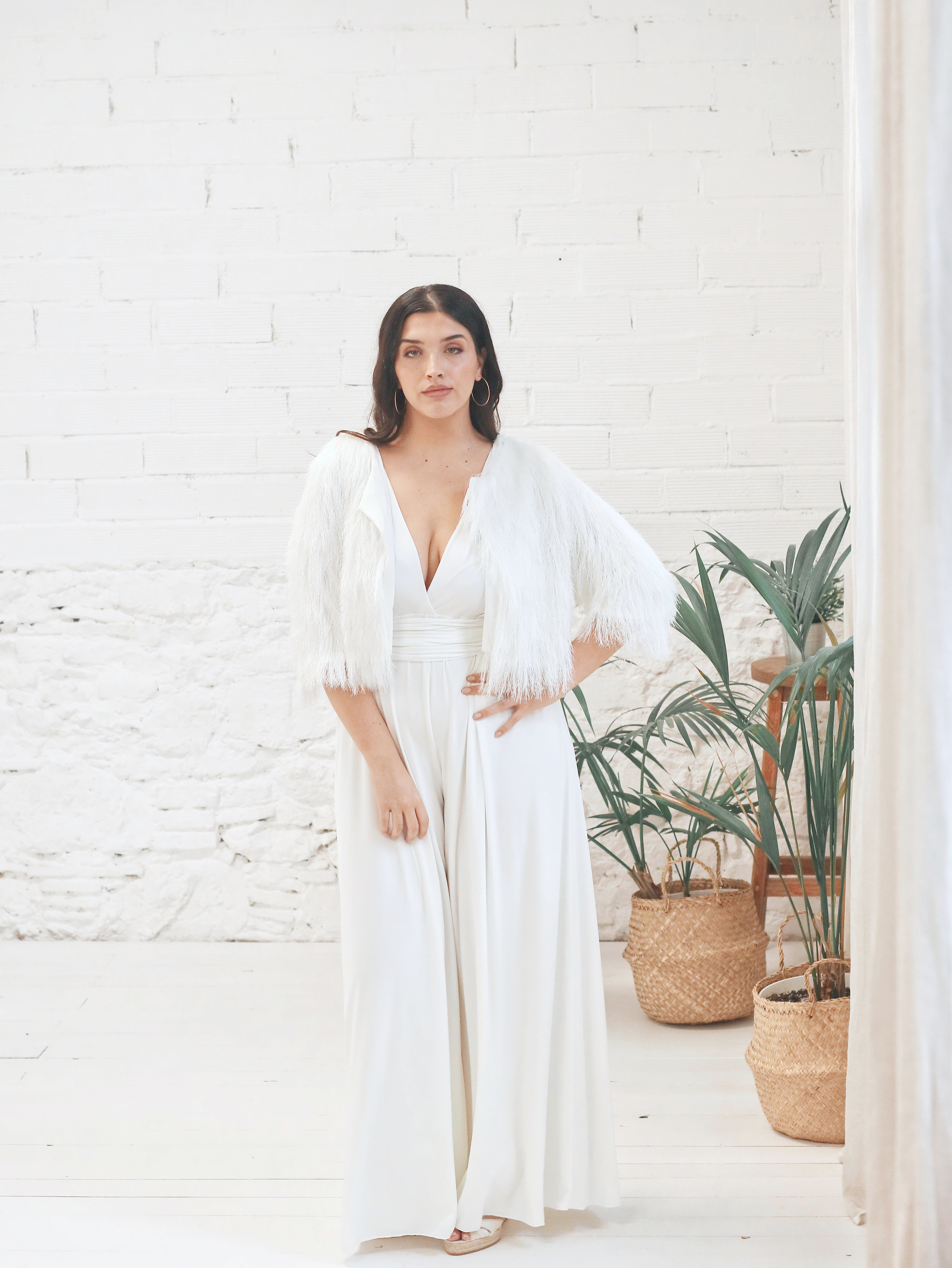 Bridal jumpsuit with short fur jacket