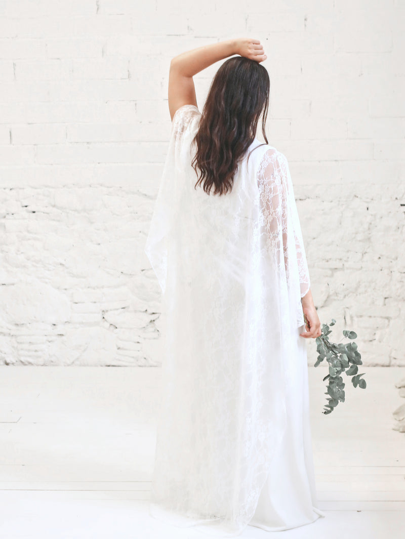 Wedding dress with lace cape